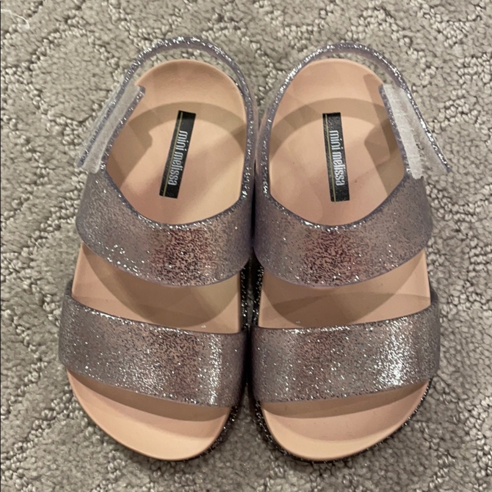 Mini Melissa’s. Never worn